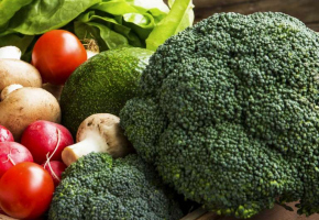 Bio vegetables in wooden crate with radish,salad,mushrooms,brocc